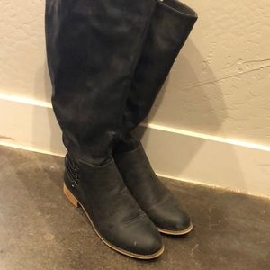 Black tall boots.